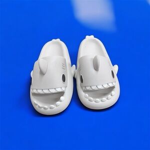 Men’s “The Cloudies’ size 11 slip one New never worn.